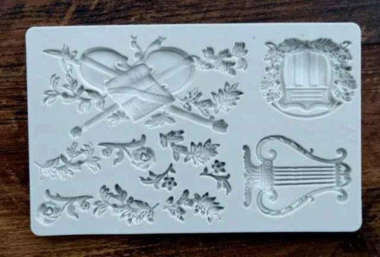 Strumenti Musicali Scudetto e decorazioni floreali. Stampo in silicone