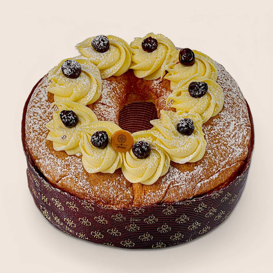 Zeppola di San Giuseppe lievitata, ricca di amarene e crema alla vaniglia.