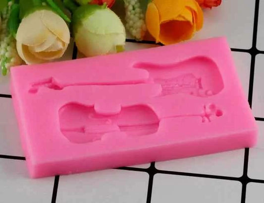Chitarra e Violino. Stampo in silicone strumenti musicali.