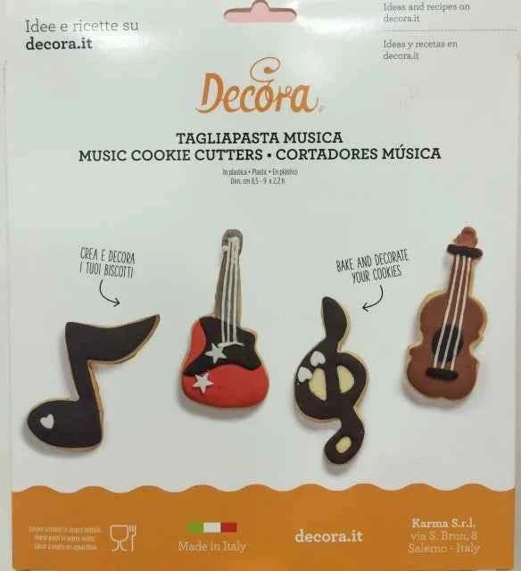 Musica. Set di 12 Tagliapasta in metallo a forma di Strumenti Musicali.